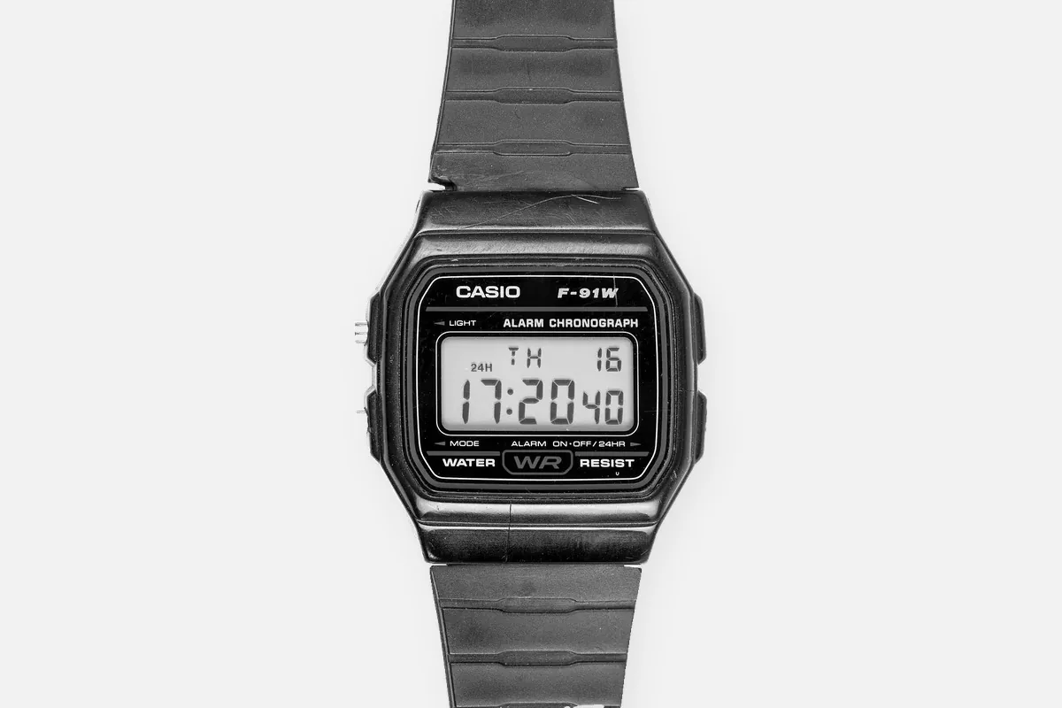 Casio F-91W digital watch on a black resin strap